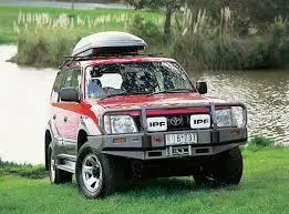 Бампер DELUXE PRADO 90 до 00г.